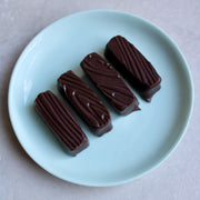 Petit Fours of Caramel° Enrobed in Dark Chocolate